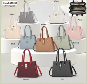 Detail showing multi-color trapezoid handbags with dimensions 30x13x22cm and layered interior