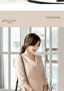 Detail of elegant pearl buttons on sleeves of a beige soft-textured knit dress