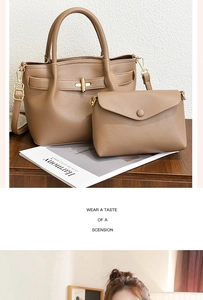 Detail of two-piece tote bag set with pebble grain texture and golden hardware accents