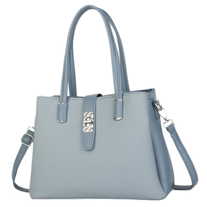Light blue twill fabric and leather bucket bag with silver hardware and shoulder strap