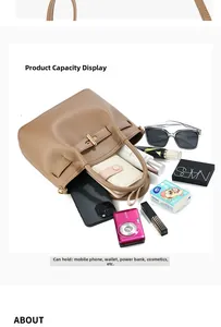 Detail showing internal capacity of the brown lychee pattern leather tote bag with items