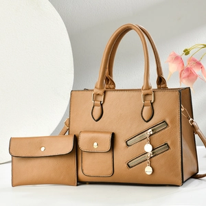 Brown lychee leather handbag set with gold zipper details and envelope wallet pouch