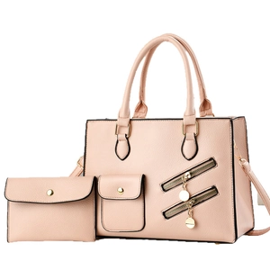 Pale pink lychee grain faux leather tote bag and pouch set with dual zipper detail