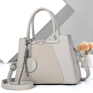 Light gray large tote bag with textured leather and fabric panels for women daily use