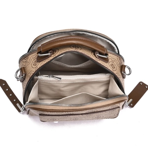 Top view showing the spacious three-compartment interior of a vintage brown handbag