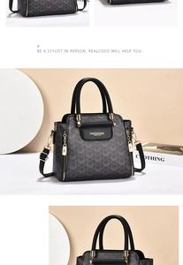 Dettaglio borsa jacquard grigio scuro con motivi floreali vintage e finiture dorate