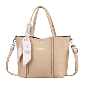 Beige lychee leather tote bag with silk scarf and adjustable strap for women