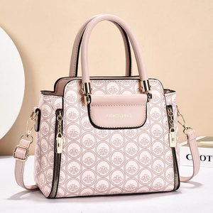 Borsa a mano rosa con goffratura floreale e tracolla regolabile per donne pendolari