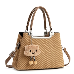 Brown herringbone textured tote bag with detachable shoulder strap and cute plush charm