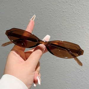 Lunettes de soleil œil de chat ovales marron café rétro avec monture fine en plastique