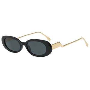 Lunettes de soleil ovales noires avec branches métalliques dorées en zigzag et verres foncés