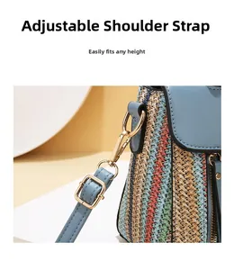 Detail of adjustable blue leather strap with gold metal hooks on woven tote bag