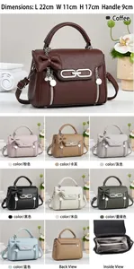 Detailansicht der Ledertasche mit großer Schleife, Perlenanhänger und Metall-Reißverschlüssen