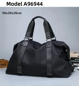Detailed view of the black travel bag showing dimensions 50x20x28cm and model A96944
