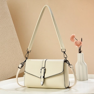 Elegant cream white lychee texture crossbody bag with dark grey metal buckle and dual straps