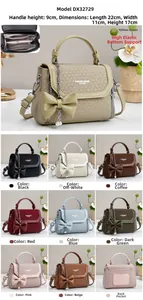 Detail view of woven texture crossbody bag with pearl charms and multiple color options
