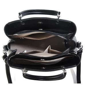 Structure interne du sac à main en cuir noir avec plusieurs compartiments et poche zippée