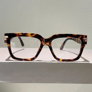 Classic tortoise shell square blue light glasses with stylish gold trim on temples