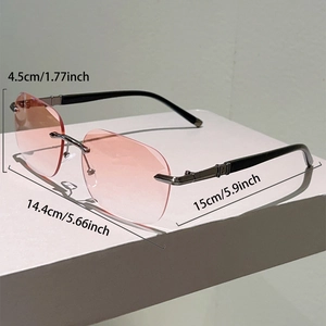 Detailed size specifications of pink rimless sunglasses showing lens height and frame width