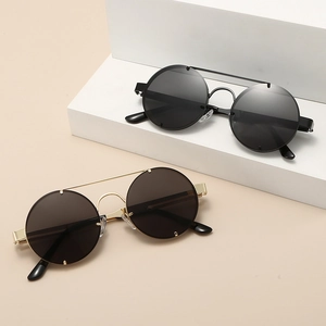 Retro punk round metal sunglasses with double bridge and spring frames on geometric stands