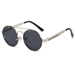 Detailed view of steampunk round metal frames with double bridge and spring temple detail