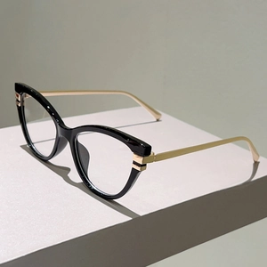 Blaulichtfilter Brille im Cat-Eye-Design mit schwarz-goldem Metallrahmen auf Display