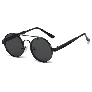 Macro detail of steampunk metal sunglasses with spring hinges and double bridge design