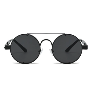 Detailed close-up of retro punk metal double bridge round sunglasses with dark grey lenses
