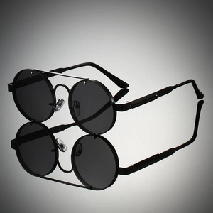 Detailed close-up of double-bridge metal frames and smooth lenses on punk sunglasses