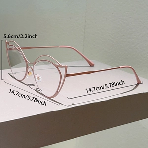 Pink cat-ear metal eyeglass frame with precise dimensions of 5.6cm and 14.7cm
