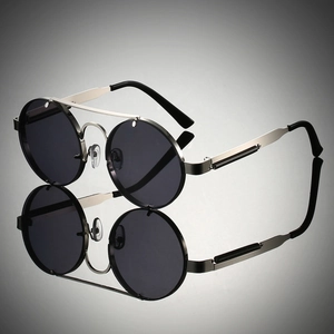 Detail of silver steampunk glasses with double bridge and unique spring temple mechanism
