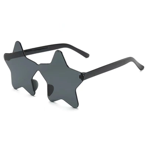 Detail shot of black star-shaped rimless sunglasses for trendy party and stage outfits