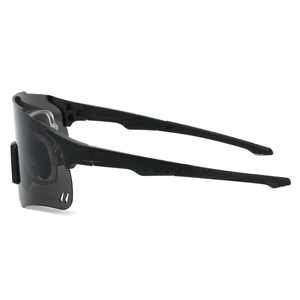 Detail view of sport sunglasses featuring breathable temples and inner prescription frame