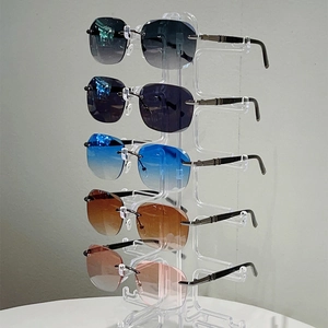 Sleek rimless oval sunglasses with diamond-cut gradient lenses and slim metal temples
