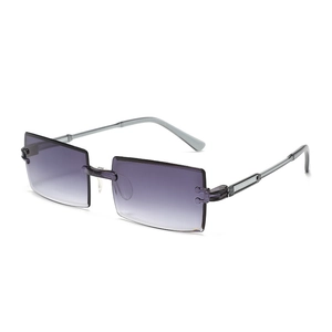 Detail of purple gradient frameless sunglasses with metal hinges and grey temples