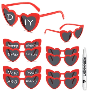 DIY red heart-shaped sunglasses set with white permanent marker for party customization