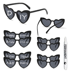 DIY heart-shaped party sunglasses set with black plastic frames and a white marker pen
