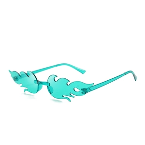 Detail of teal flame-shaped rimless sunglasses featuring a smooth integrated nose pad