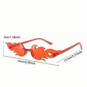 Detail view of flame-shaped sunglasses with size dimensions: 16cm width and 3cm height