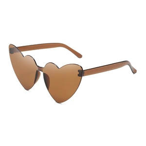 Detail view of heart-shaped rimless sunglasses in brown translucent lens with metal hinges