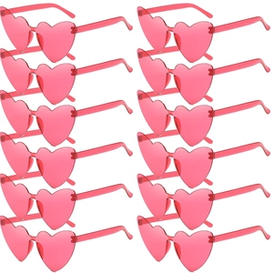 Set di 12 occhiali da sole a cuore rosa senza montatura in una matrice simmetrica