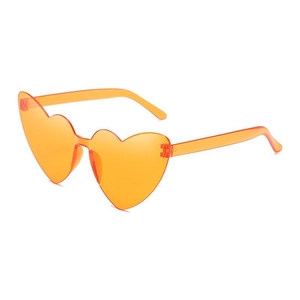 Detail view of heart-shaped rimless sunglasses in translucent orange finish
