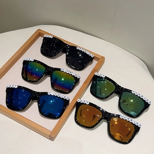 Close-up of Just Married party sunglasses with white bead letters in five lens colors