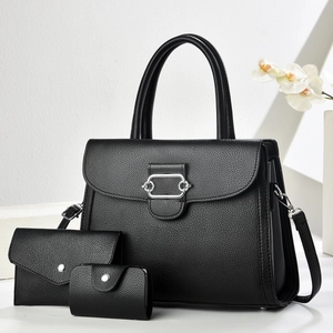 Three-piece black lychee pattern leather handbag set with shoulder strap and metal hardware
