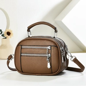 Brown litchi grain multi-layer crossbody bag with double front zippers and top handles