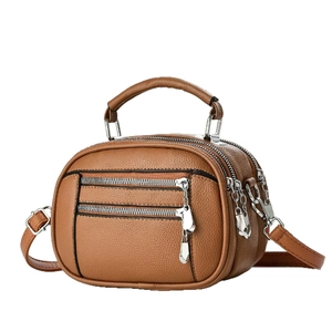 Brown lychee grain PU leather multi-layer crossbody bag with silver zippers and handles