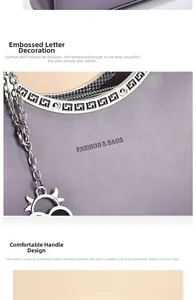 Detail of purple handbag featuring fashion embossed text and metallic sun charm accents