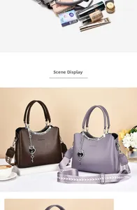 Detail showing spacious interior of the fashion tote bag with stylish wide shoulder strap