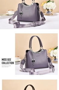 Close-up of purple faux leather bag with wide woven strap and heart lock pendant