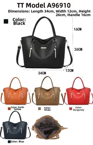 Detailed view of leather tote bag structure with multiple compartments and long shoulder strap
